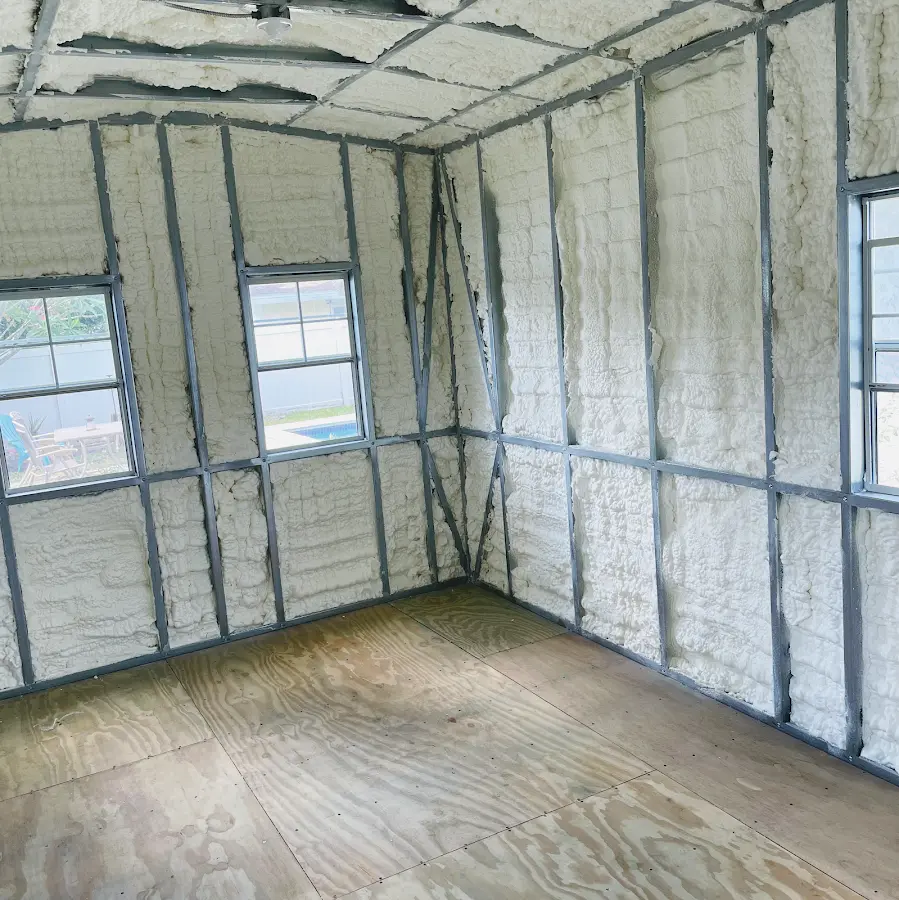 Closed-cell spray foam insulation applied to wall cavities in a residential project in Westland